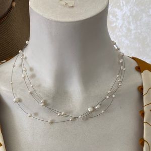 18” triple strand faux pearl and wire necklace